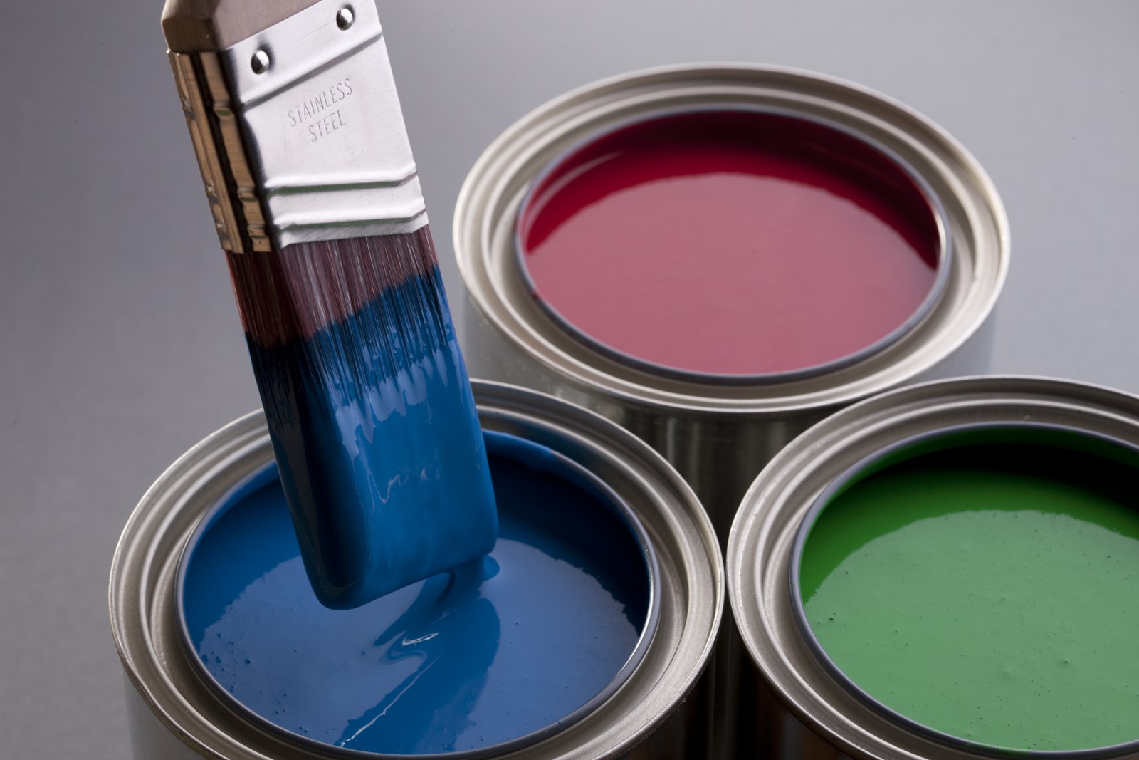 Paint brush and trade quality paint tins